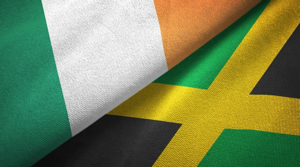 アイルランドとジャマイカ2つの旗織物布、生地の質感 — ストック写真