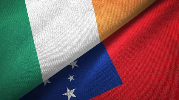アイルランドとサモア2つの旗織物布、生地の質感 — ストック写真
