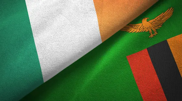 アイルランドとザンビアの2つの旗織物布、生地の質感 — ストック写真