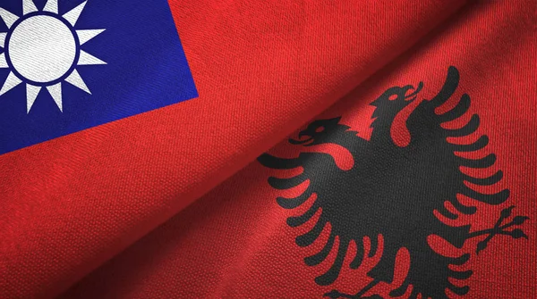 Taiwan and Albania two flags textile cloth, fabric texture