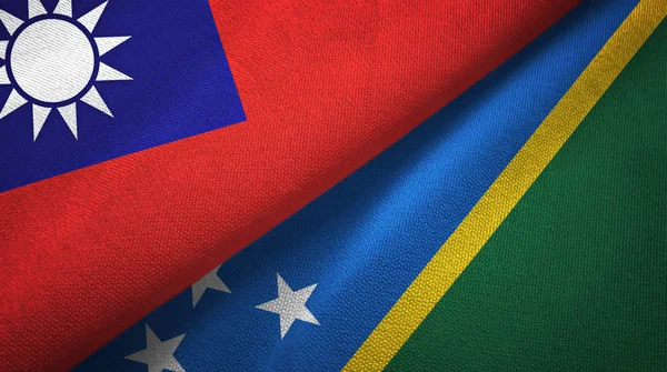 Taiwan and Solomon Islands two flags textile cloth, fabric texture