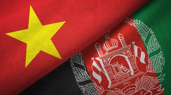 Vietnam and Afghanistan two flags textile cloth, fabric texture — Stock Photo, Image