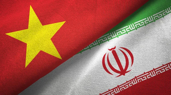 Vietnam and Iran two flags textile cloth, fabric texture — Stock Photo, Image