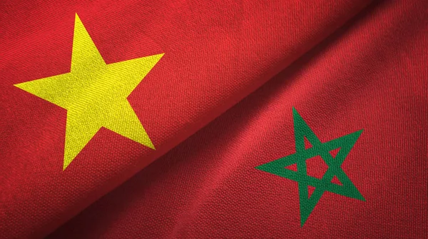 Vietnam en Marokko twee vlaggen textiel doek, stof textuur — Stockfoto