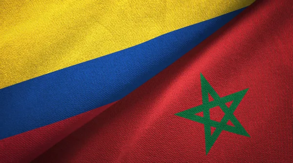 Colombia en Marokko twee vlaggen textiel doek, weefsel textuur — Stockfoto