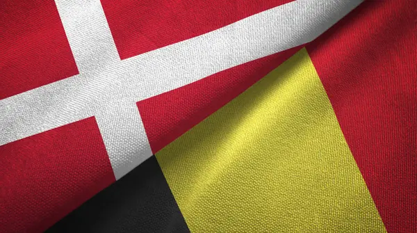 Denemarken en België twee vlaggen textiel doek, stof textuur — Stockfoto