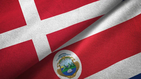 Danmark och Costa Rica två flaggor textil tyg, tyg konsistens — Stockfoto
