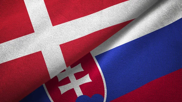 Данія і Словаччина два прапори текстильна тканина, текстура тканини — стокове фото