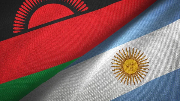 Малави и Аргентина два флага текстильная ткань, текстура ткани — стоковое фото