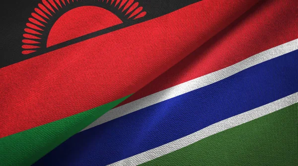 Malawi und Gambia zwei Flaggen Textilstoff, Textur — Stockfoto