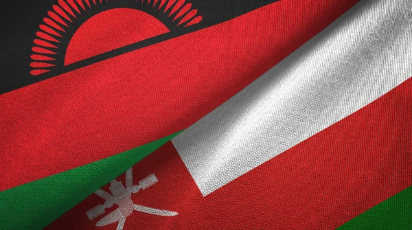 Malawi and Oman two flags textile cloth, fabric texture — Stock Photo, Image