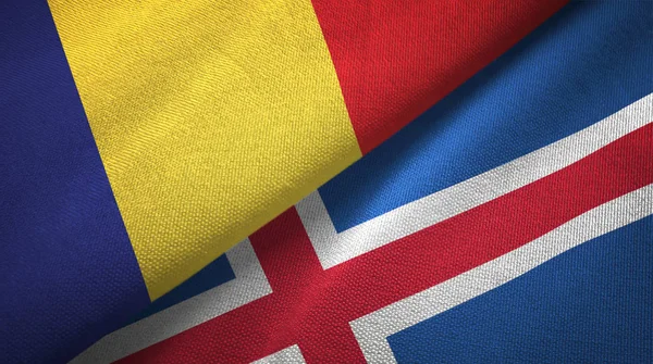 Roemenië en IJsland twee vlaggen textiel doek, weefsel textuur — Stockfoto