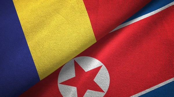 Romanya ve Kuzey Kore iki bayrak tekstil kumaş, kumaş doku