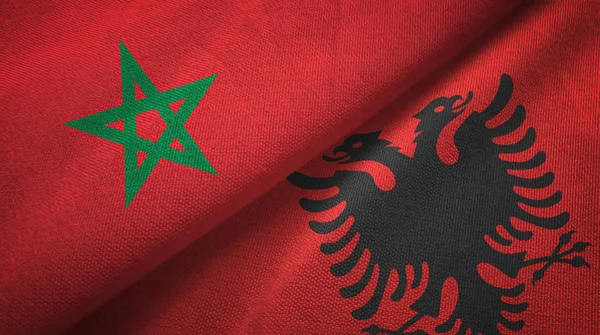 Morocco and Albania two flags textile cloth, fabric texture
