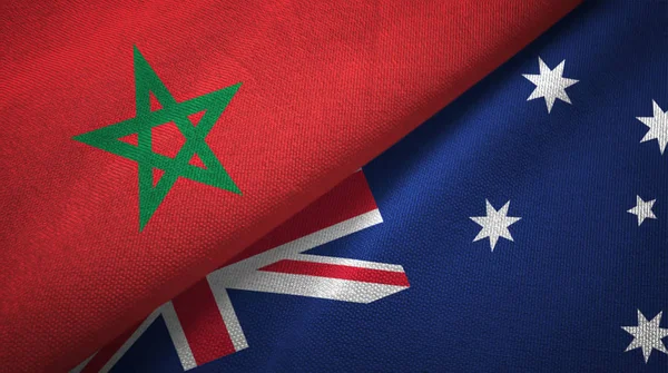 Marokko en Australië twee vlaggen textiel doek, weefsel textuur — Stockfoto