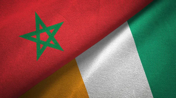 Marokko en Cote d'Ivoire Ivoorkust twee vlaggen textielweefsel textuur — Stockfoto
