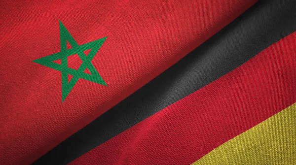 Marokko en Duitsland twee vlaggen textiel doek, weefsel textuur — Stockfoto