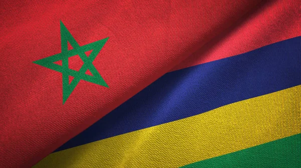 Marokko en Mauritius twee vlaggen textiel doek, stof textuur — Stockfoto