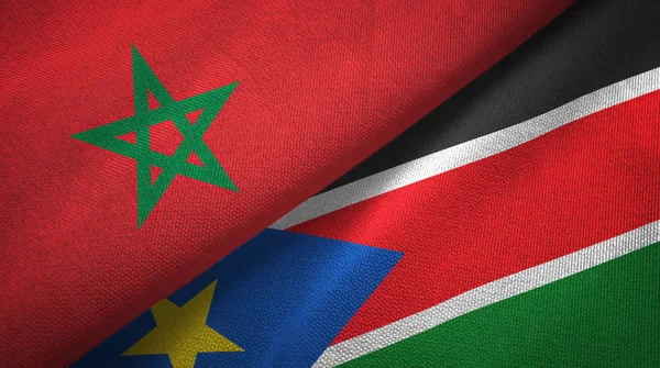 Marokko en Zuid-Soedan twee vlaggen textiel doek, weefsel textuur — Stockfoto