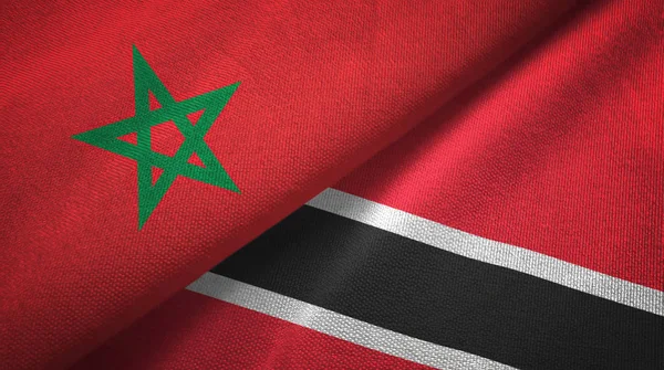 Marokko en Trinidad en Tobago twee vlaggen textiel doek, weefsel textuur — Stockfoto