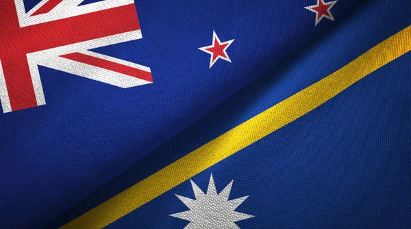 Новая Зеландия и Науру два флага текстильная ткань, текстура ткани — стоковое фото