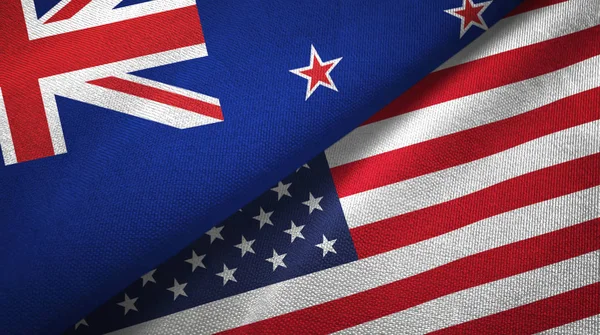 New Zealand and United States two flags textile cloth, fabric texture — Stock Photo, Image