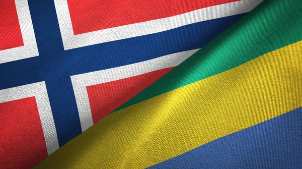 Noruega y Gabón dos banderas tela textil, textura de la tela — Foto de Stock