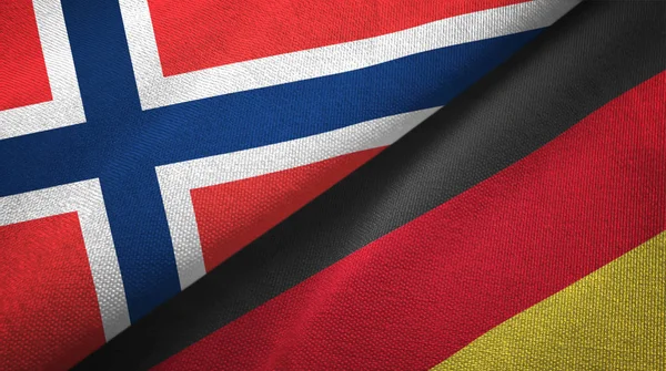 Norveç ve Almanya iki bayrak tekstil kumaş, kumaş doku — Stok fotoğraf