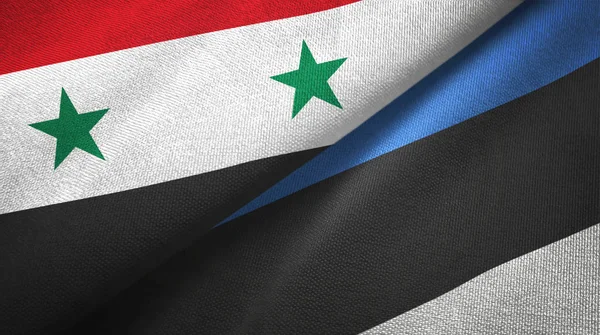 Suriah dan Estonia dua bendera kain tekstil, tekstur kain — Stok Foto
