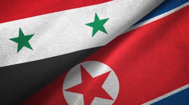 Suriye ve Kuzey Kore iki bayrak tekstil kumaş, kumaş doku