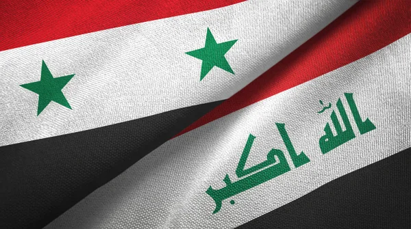 Сирия и Ирак два флага текстильной ткани — стоковое фото