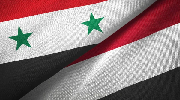 Suriah dan Yaman dua bendera kain tekstil, tekstur kain — Stok Foto