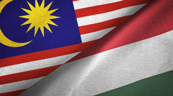 Malaysia and Hungary two flags textile cloth, fabric texture