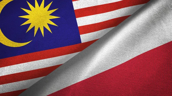 Malajzia és Lengyelország két zászló textil ruhával, szövet textúra — Stock Fotó