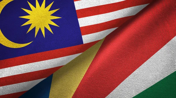 Malaysia und die Seychellen zwei Flaggen Textilstoff, Textur — Stockfoto