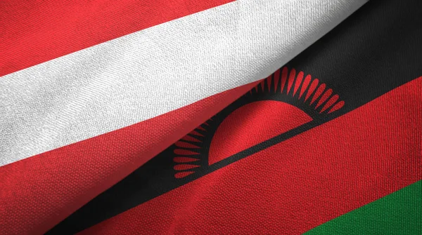 Austria e Malawi due bandiere tessuto, tessitura tessuto — Foto Stock