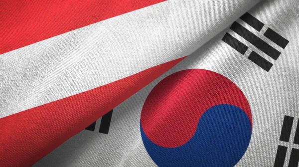 Austria and South Korea two flags textile cloth, fabric texture — Stock Photo, Image