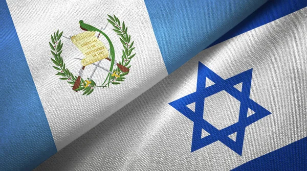 Guatemala e Israel duas bandeiras de pano têxtil, textura de tecido — Fotografia de Stock