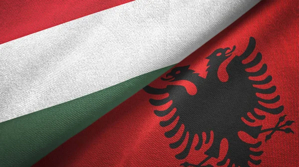 Hungary and Albania two flags textile cloth, fabric texture