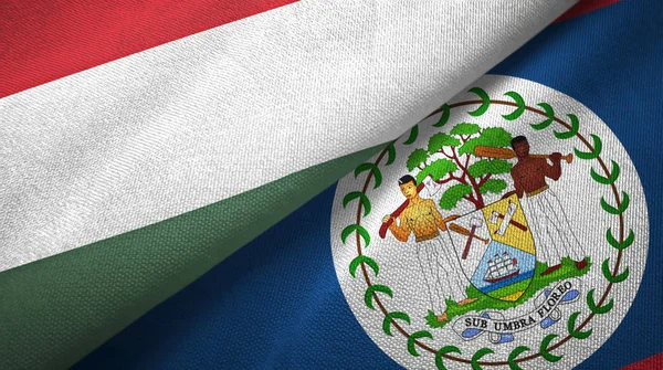 Hongarije en Belize twee vlaggen textiel doek, weefsel textuur — Stockfoto