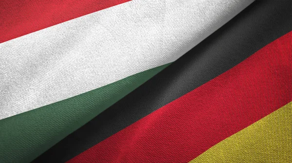 Ungheria e Germania due bandiere tessuto, tessitura tessuto — Foto Stock