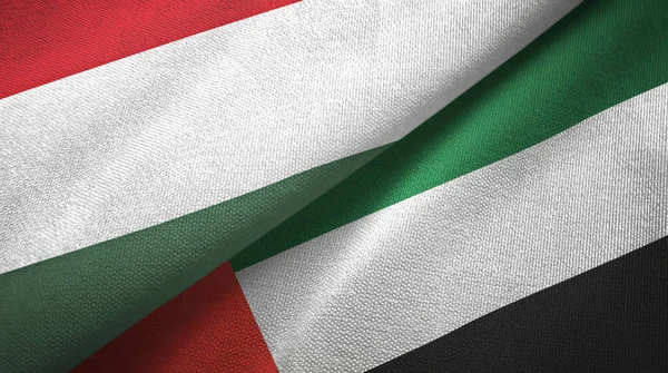 Hungary and United Arab Emirates two flags textile cloth, fabric texture — Stock Photo, Image