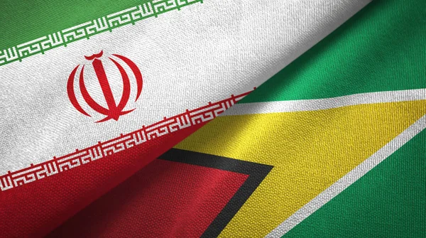 Iran and Guyana two flags textile cloth, fabric texture