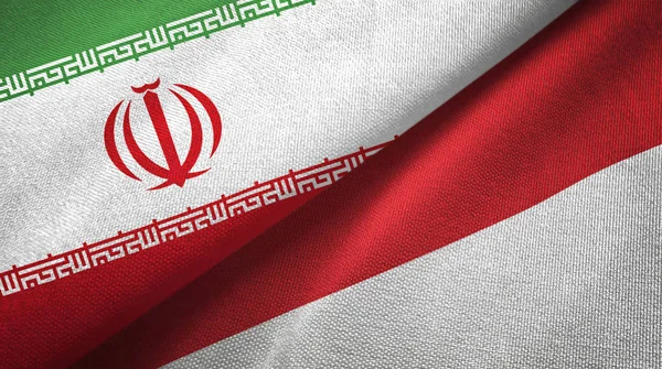 Iran and Indonesia two flags textile cloth, fabric texture