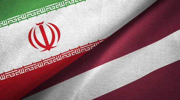 Iran and Latvia two flags textile cloth, fabric texture