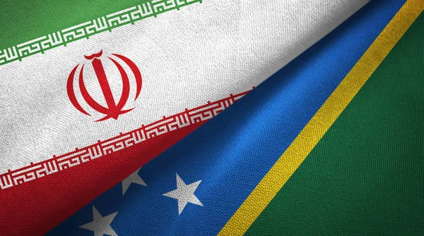 Iran and Solomon Islands two flags textile cloth, fabric texture