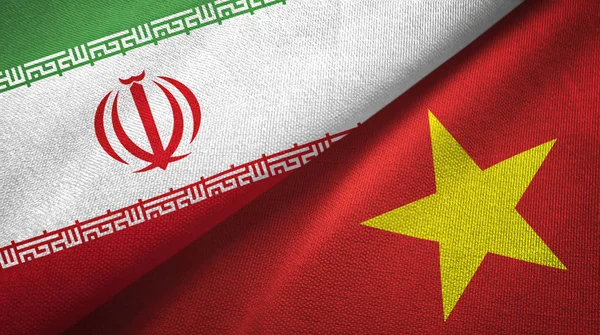 Iran and Vietnam two flags textile cloth, fabric texture — Stock Photo, Image