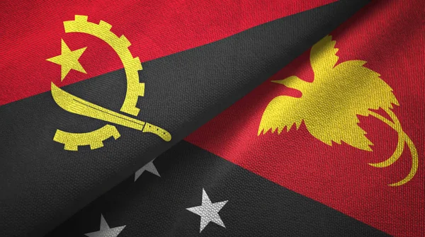 Angola ve Papua Yeni Gine iki bayraklar tekstil kumaş, kumaş doku — Stok fotoğraf