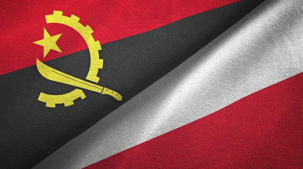 Angola e Polonia due bandiere tessuto, tessitura tessuto — Foto Stock