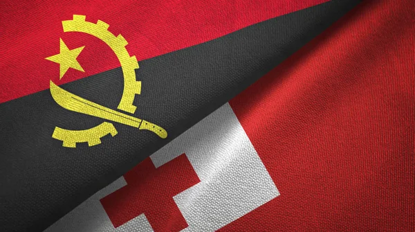 Angola und Tonga zwei Flaggen Textilgewebe, Textur — Stockfoto